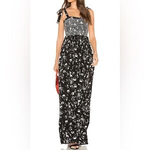 free people long black floral jumpsuit with pockets.